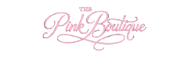Logo of The Pink Boutique with a pink cursive font on a white background